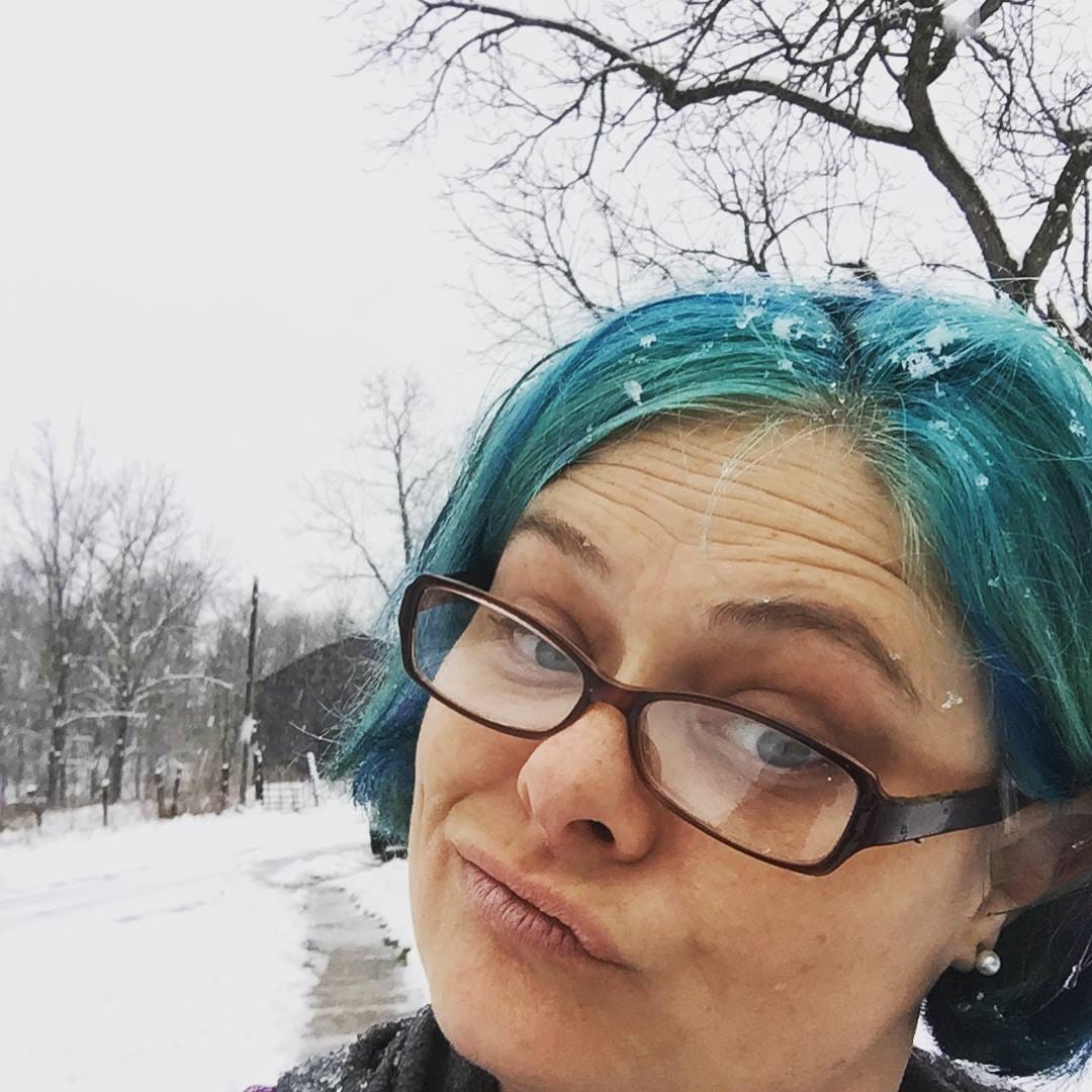 In my tall boots, raking out whatever lands in front of me